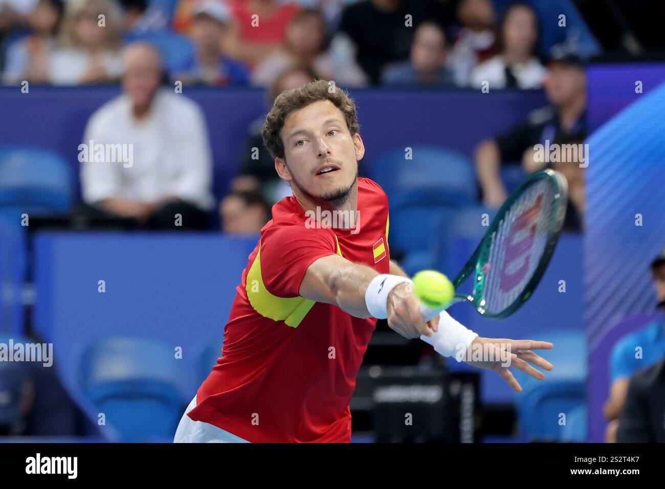 Pablo Carreno Busta of Spain in action against Stefanos Tsitsipas of
