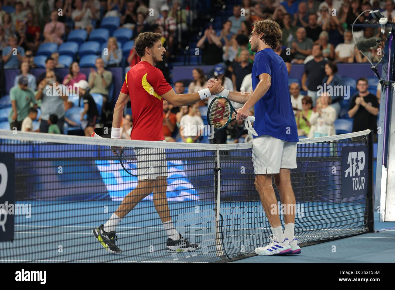Stefanos Tsitsipas (right) of Greece is congratulated by Pablo Carreno