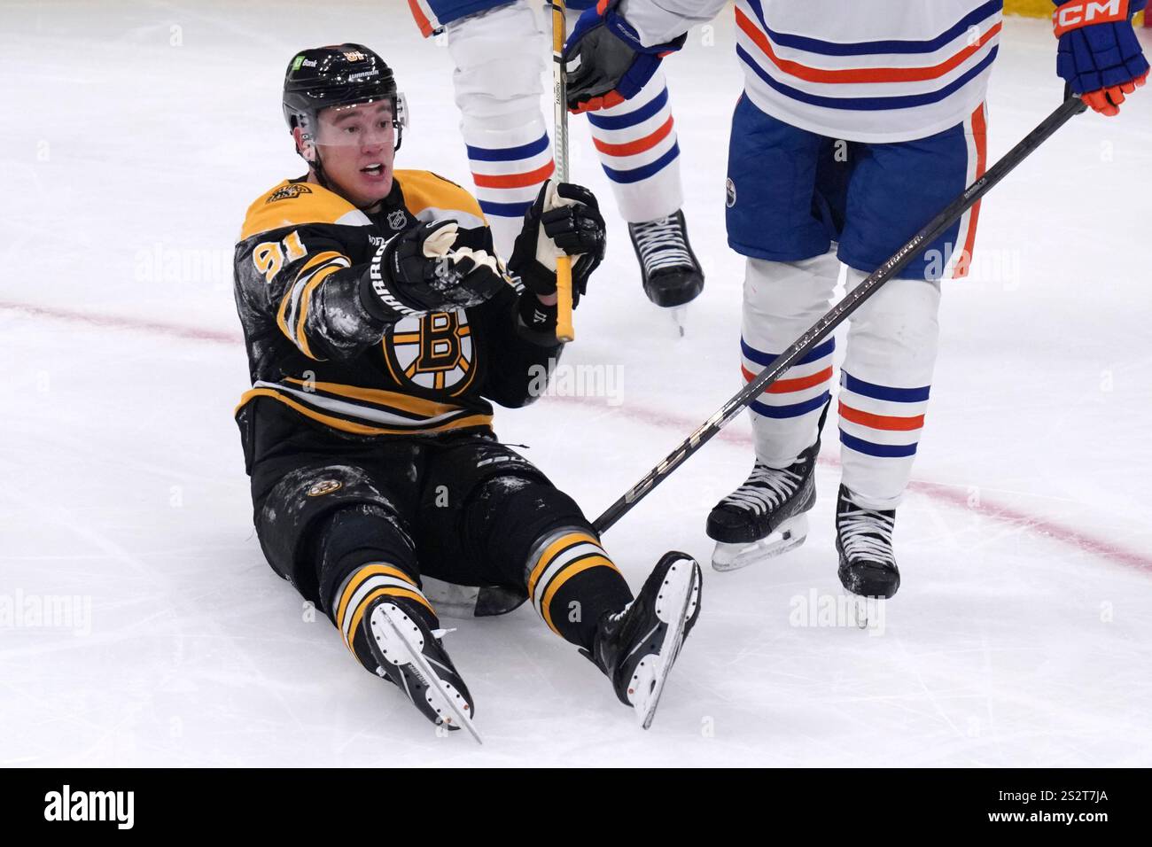 Bruins defenseman Nikita Zadorov argues after drawing an interference