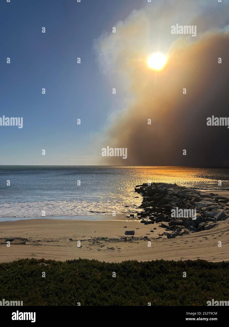 Palisades Fire, the beach bike path south of Sunset Blvd, smoke blowing out to ocean, Fire Department, LAPD staging areas on PCH, day one 1/7/2025. - Smartphone Captured Stock Image