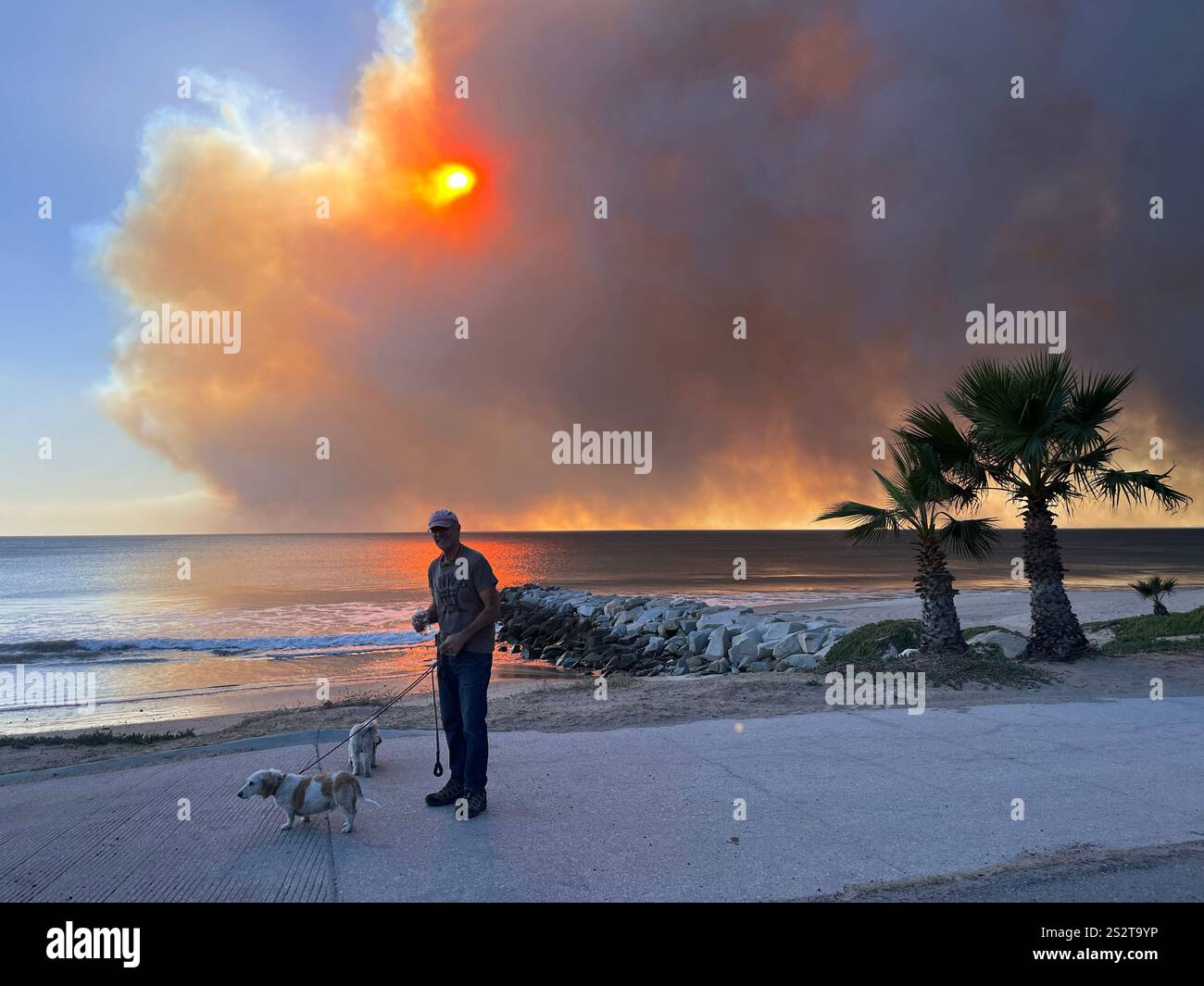 Palisades Fire, the beach bike path south of Sunset Blvd, smoke blowing out to ocean, Fire Department, LAPD staging areas on PCH, day one 1/7/2025. - Smartphone Captured Stock Image