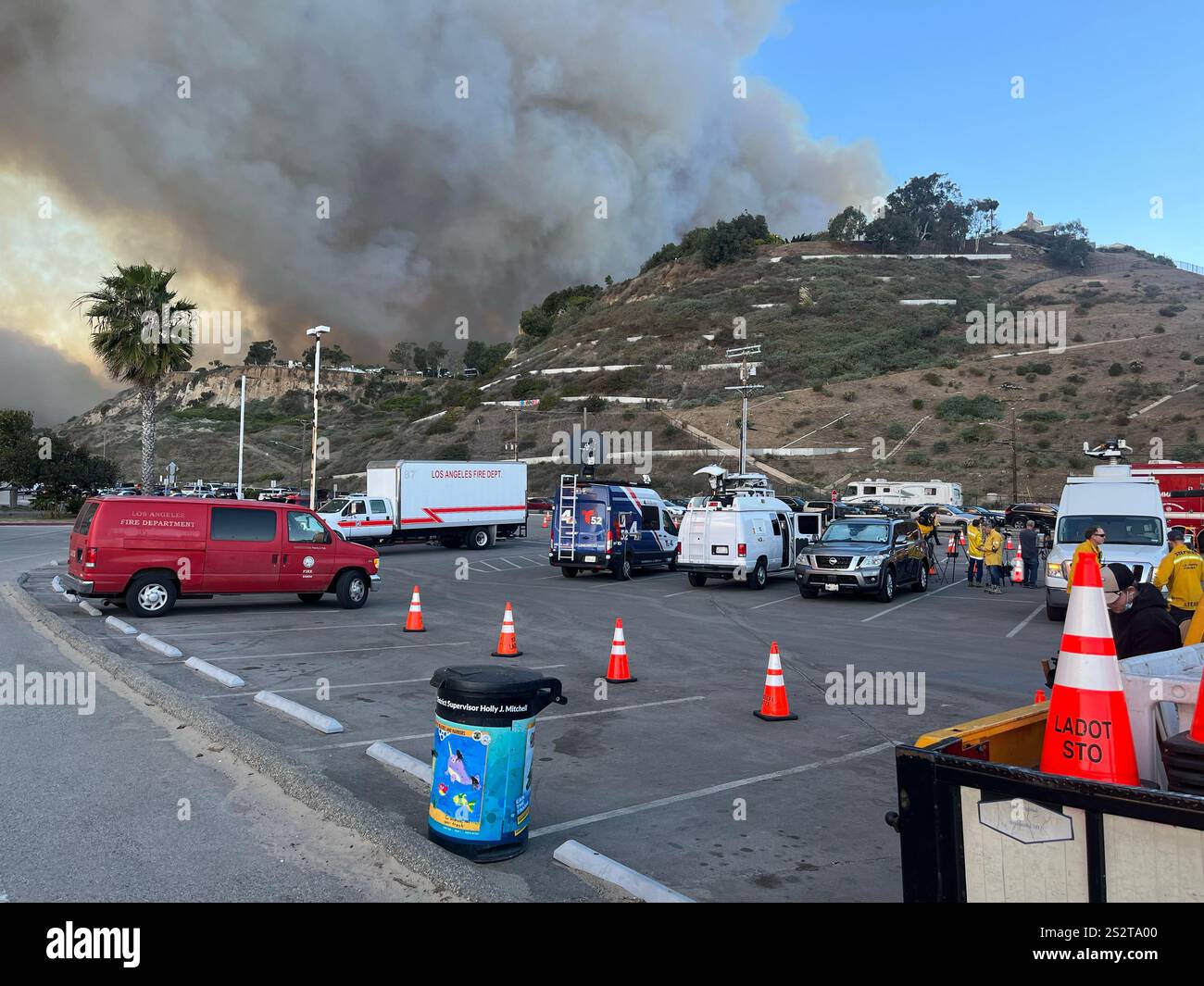 Palisades Fire, the beach bike path south of Sunset Blvd, smoke blowing out to ocean, Fire Department, LAPD staging areas on PCH, day one 1/7/2025. - Smartphone Captured Stock Image