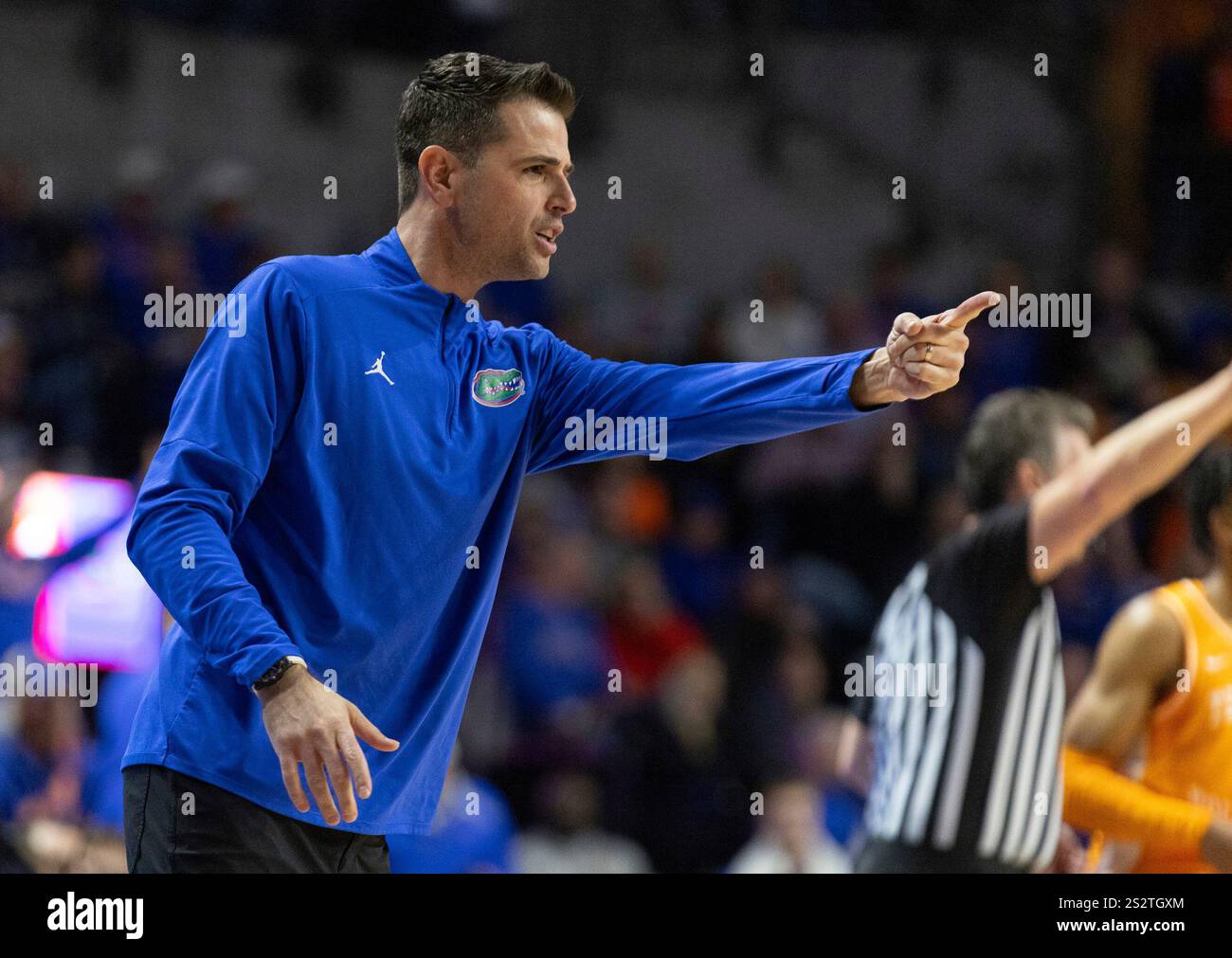 Florida head coach Todd Golden reacts during the first half of an NCAA