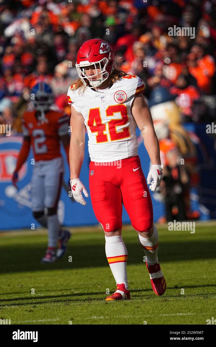 Kansas City Chiefs running back Carson Steele (42) runs a play against ...