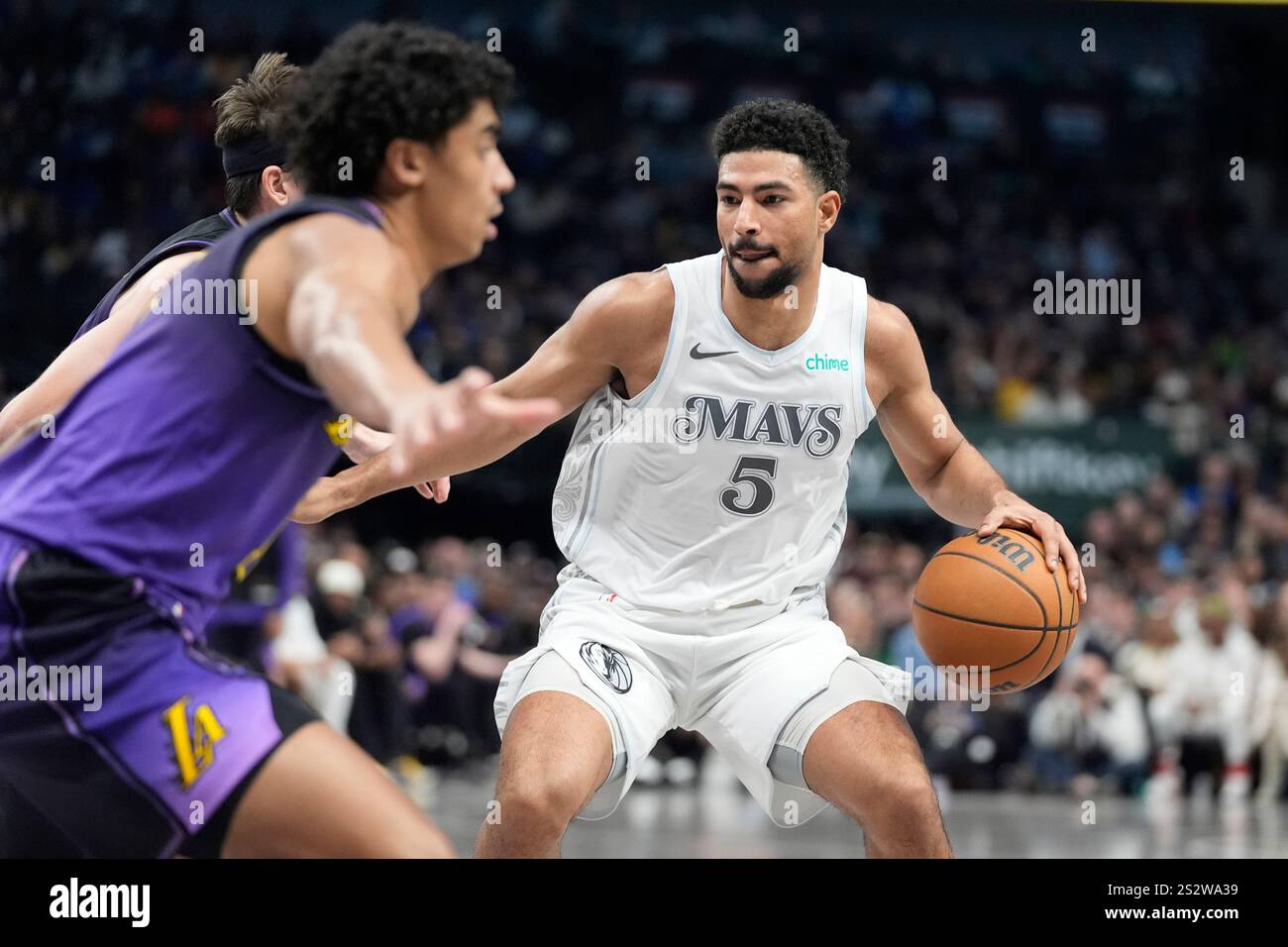Dallas Mavericks guard Quentin Grimes (5) drives during the first half