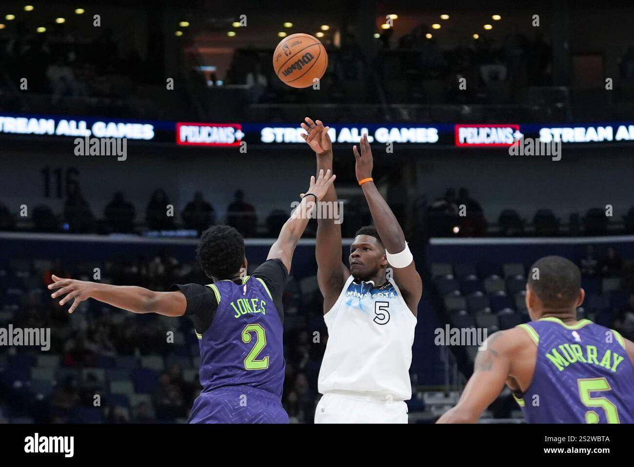 Minnesota Timberwolves guard Anthony Edwards (5) shoots against New