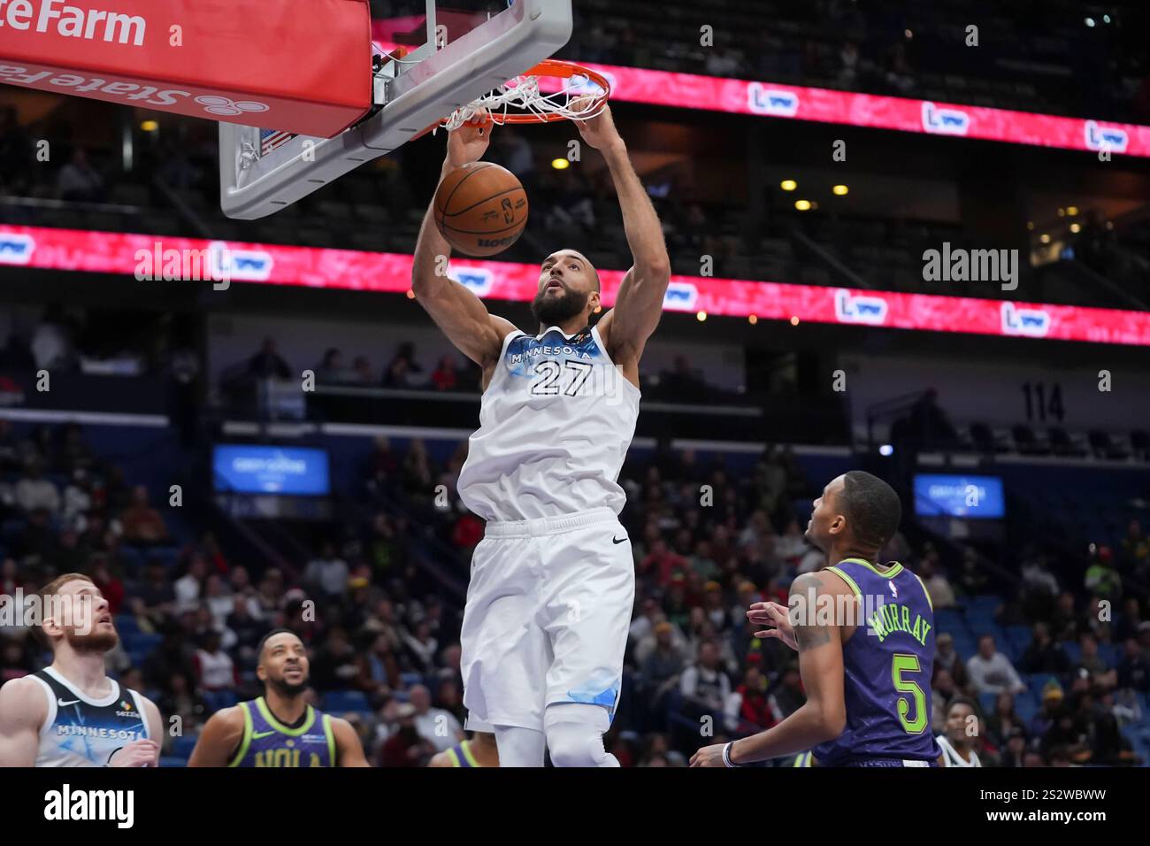 Minnesota Timberwolves center Rudy Gobert (27) slam dunks over New