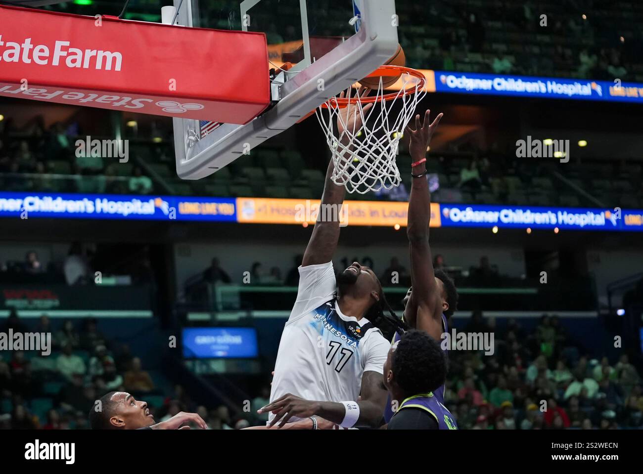 Minnesota Timberwolves center Naz Reid (11) goes to the basket against