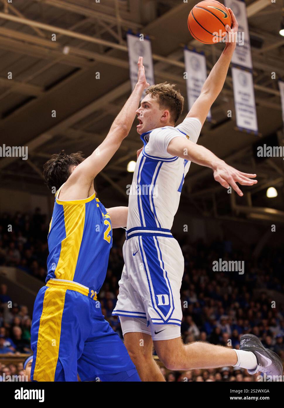 Duke's Cooper Flagg (2) dunks over Pittsburgh's Guillermo Diaz Graham