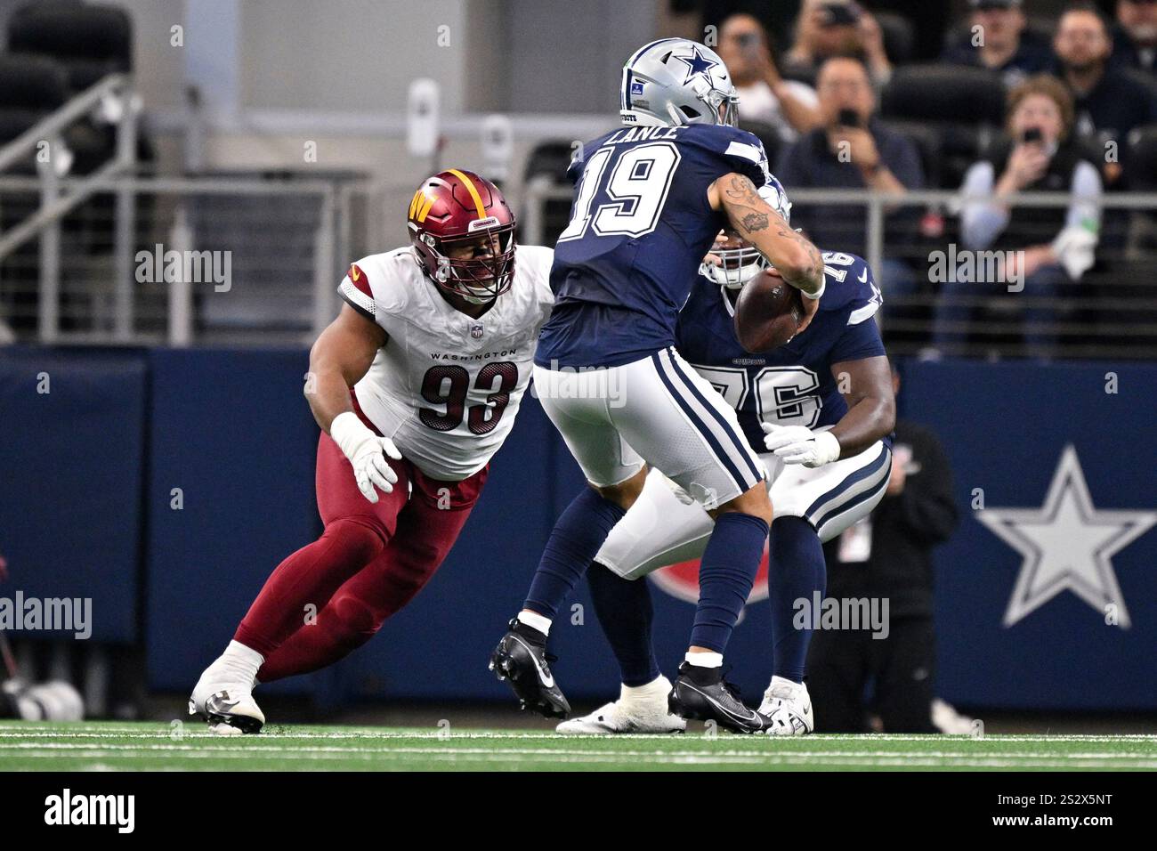 Washington Commanders defensive tackle Jonathan Allen (93) sacks Dallas