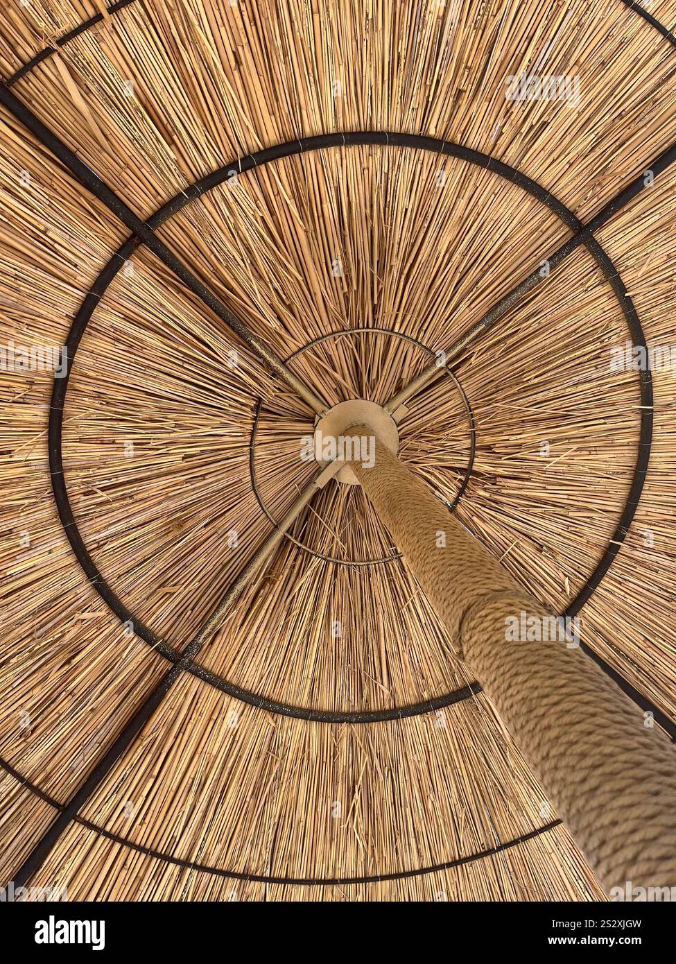 Straw beach umbrella in the beach - Smartphone Captured Stock Image