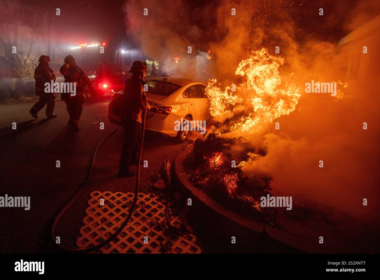 Firefighters battle the Eaton Fire Tuesday, Jan. 7, 2025 in Altadena