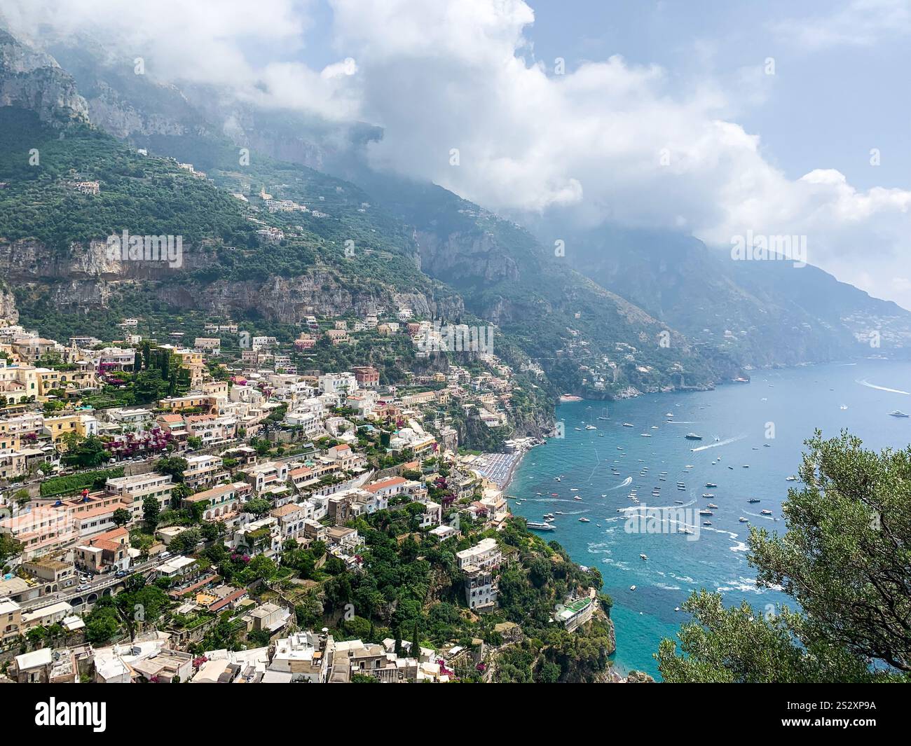 The stunning coastline of the Amalfi Coast in Positano, Italy during the beautiful summer month of July. - Smartphone Captured Stock Image