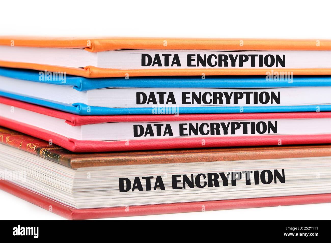 Stacked notebooks prominently display the term data encryption ...