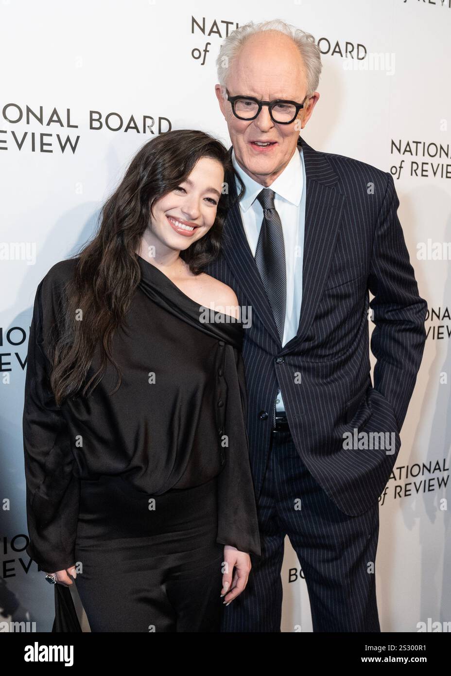 Mikey Madison wearing dress by Louis Vuitton and John Lithgow attend