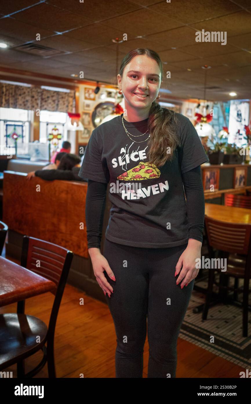 A waitress at Mystic Pizza, a restaurant in Conn and the inspiration ...