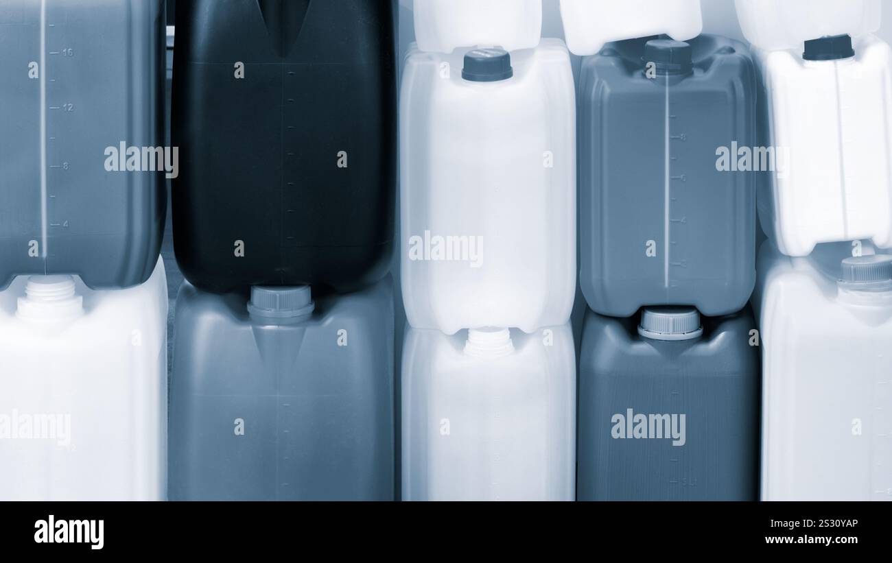 Multicolored plastic jerry can containers Stock Photo