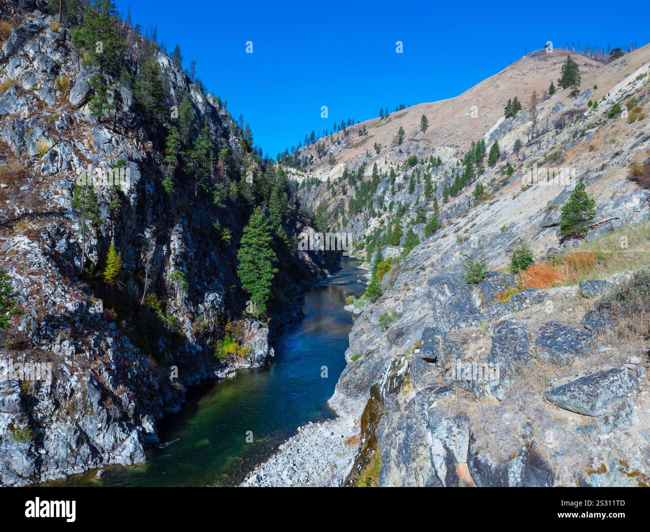 Rocky valley with the Payette River at the bottom of the gorge Stock Photo