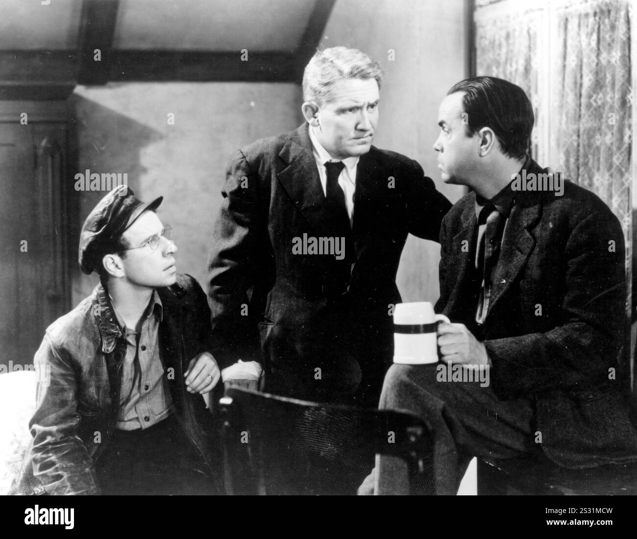 THE SEVENTH CROSS HUME CRONYN, SPENCER TRACY AND PAUL GUILFOYLE AN MGM FILM     Date: 1944 Stock Photo