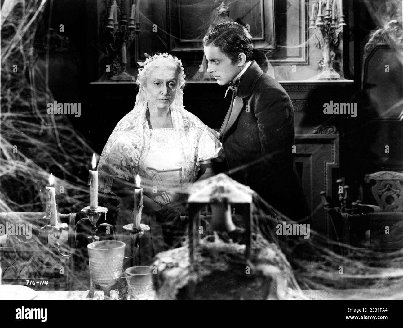 GREAT EXPECTATIONS FLORENCE REED AS MISS HAVISHAM, PHILLIPS HOLMES AS PIP     Date: 1934 Stock Photo