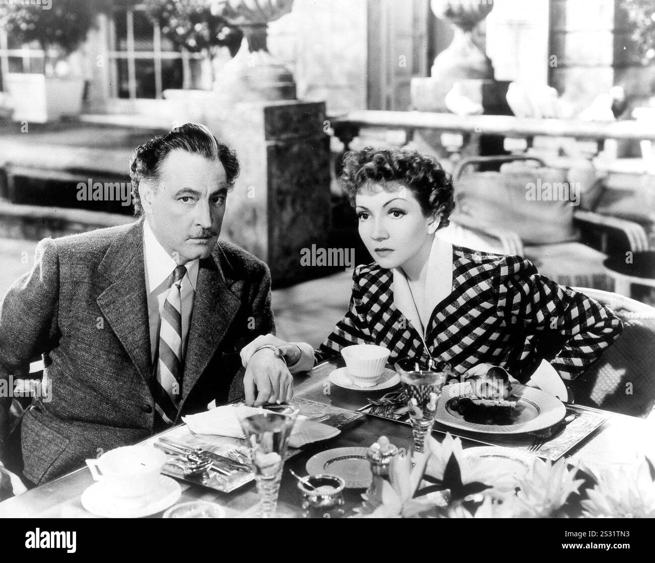 MIDNIGHT JOHN BARRYMORE, CLAUDETTE COLBERT     Date: 1939 Stock Photo