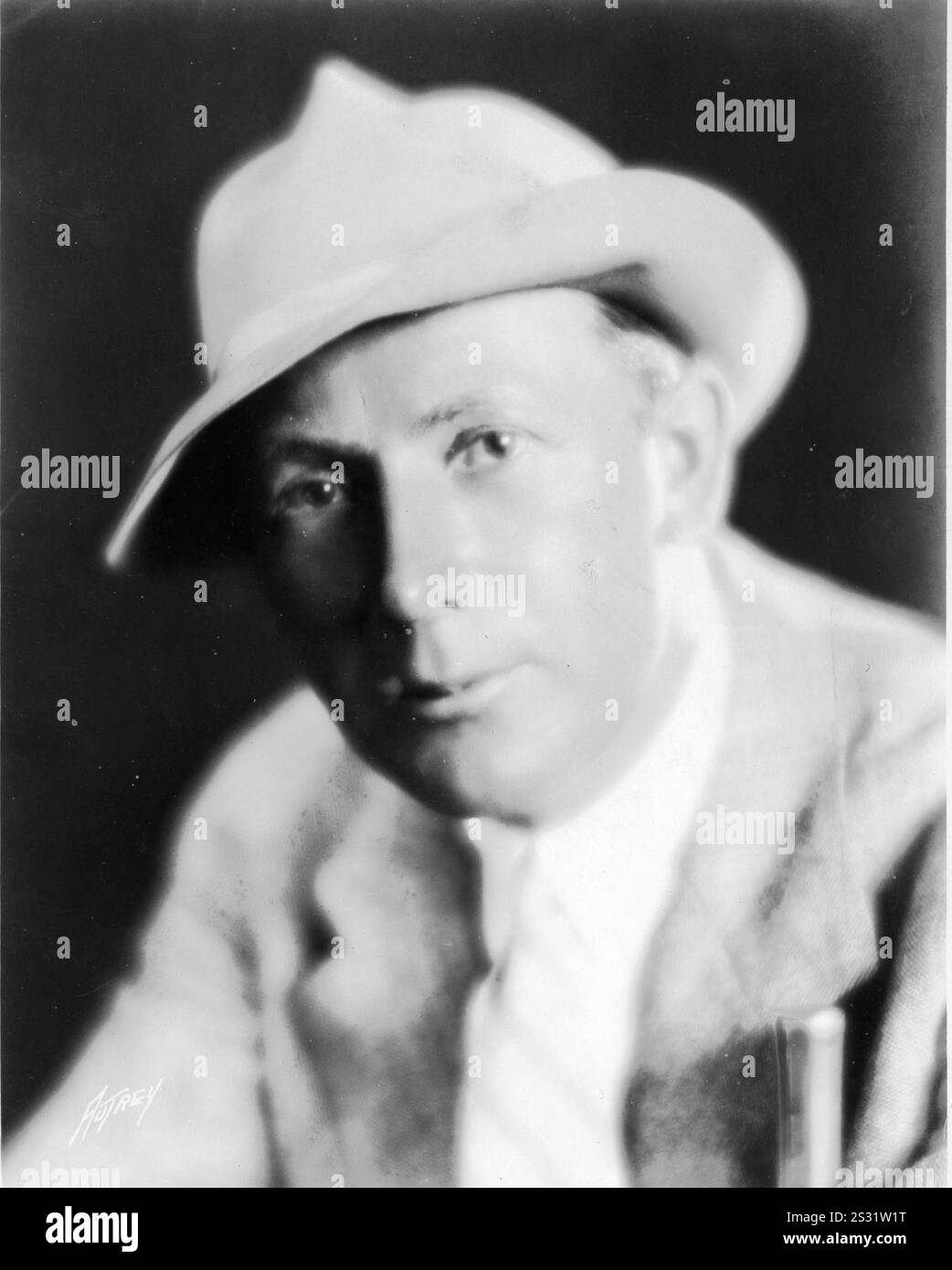 F.W. Murnau, a pioneer of visual storytelling, captured in a black-and-white photograph from 1930