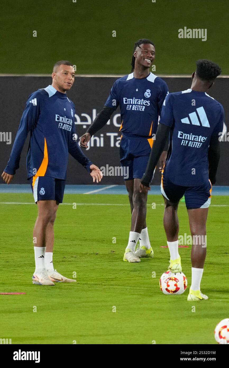Real Madrid's Kylian Mbappe, left, attends a practice session on the
