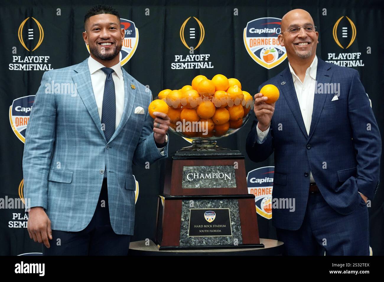 Notre Dame head coach Marcus Freeman, left, and Penn State head coach