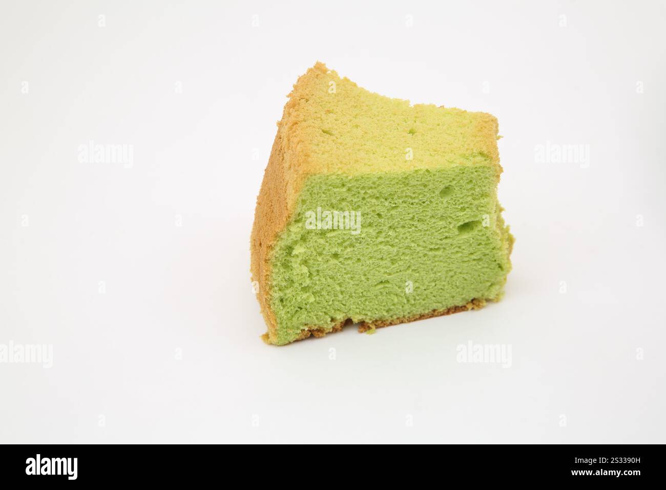 Singapore's Pandan Chiffon Cake Green Coloured Sponge made with the juices of Pandanus Amaryllifolius leaves Stock Photo