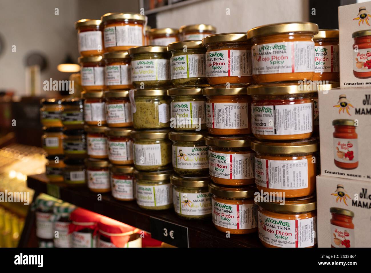 La Geria, Spain: 2024 October 16: Mojo Picon and Mojo Rojo in the Classic Winery Store of La Geria on the Tourist Island of Lanzarote in 2024. Stock Photo