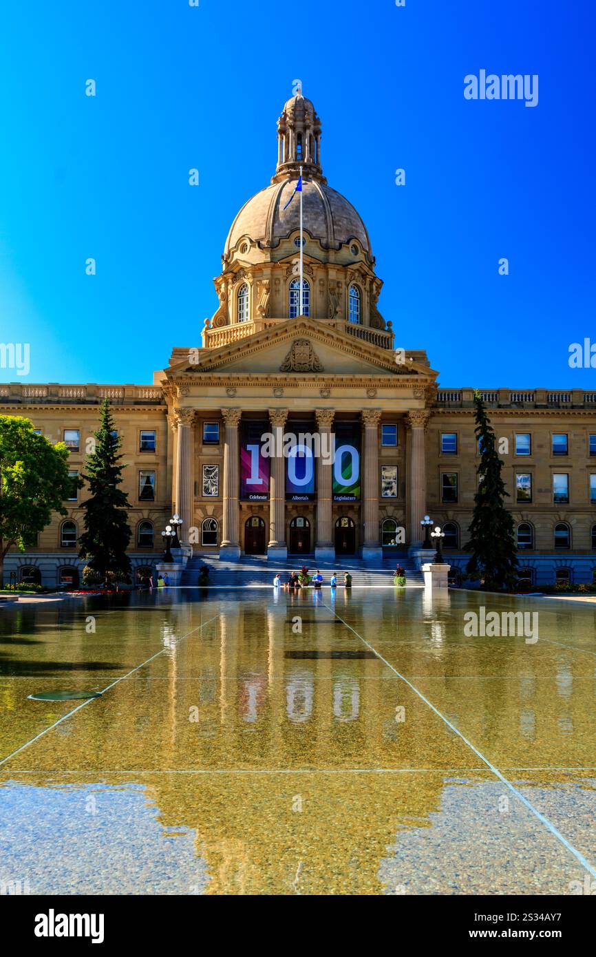 A large building with a 100 banner on it. The building is surrounded by ...