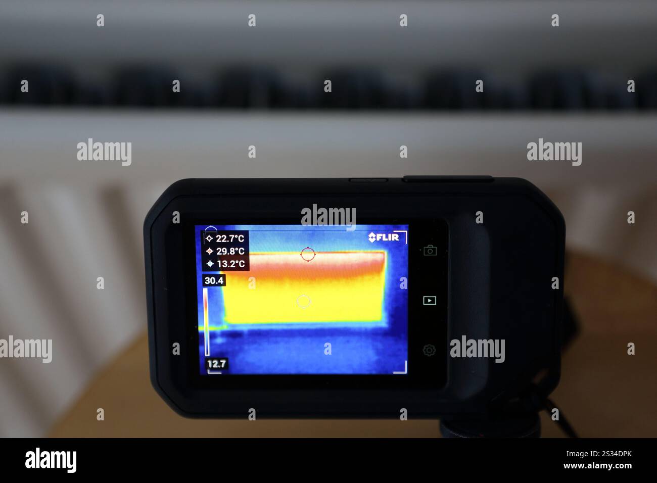 Thermal Camera Radiator Thermal imaging camera showing a central heating radiator FLIR showing ...
