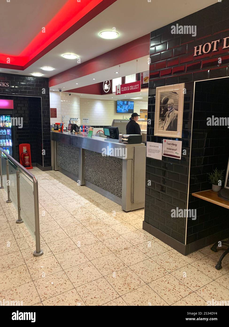 Harry Ramsden fish and chip shop first one  chips eat eating sell selling Guiseley West Yorkshire man famous chip fish place history local person live - Smartphone Captured Stock Image
