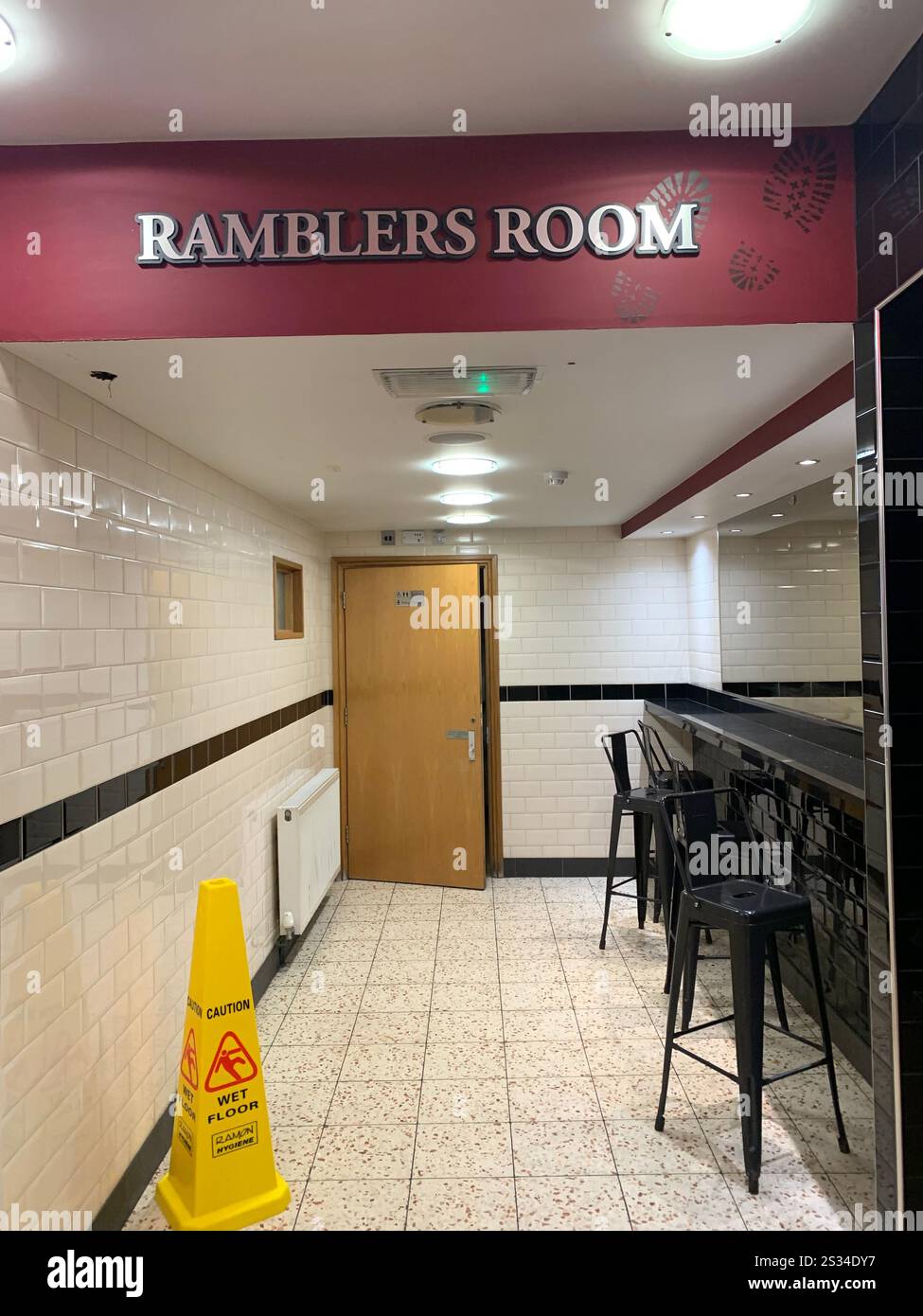 Harry Ramsden fish and chip shop first one  chips eat eating sell selling Guiseley West Yorkshire man famous chip fish place history local person live - Smartphone Captured Stock Image