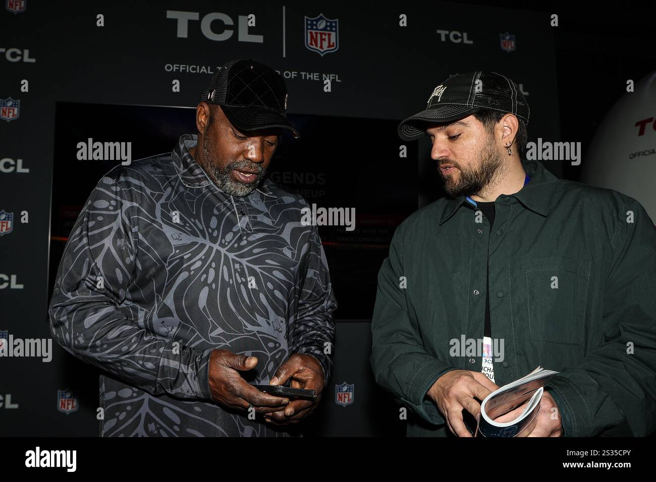 January 8, 2025 NFL Hall of Fame member Warren Sapp (L) chats with a
