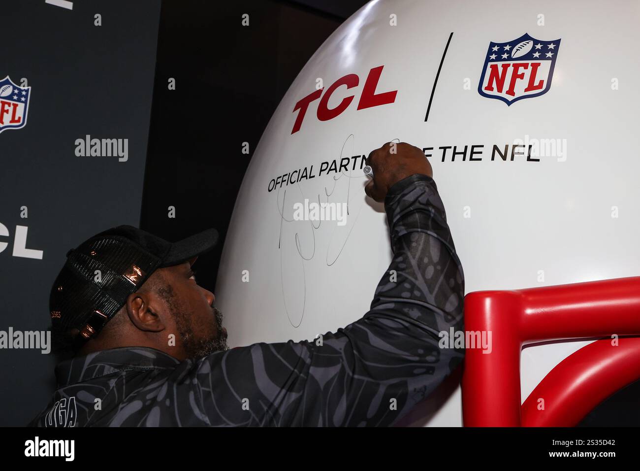 January 8, 2025 NFL Hall of Fame member Warren Sapp autographs the TCL