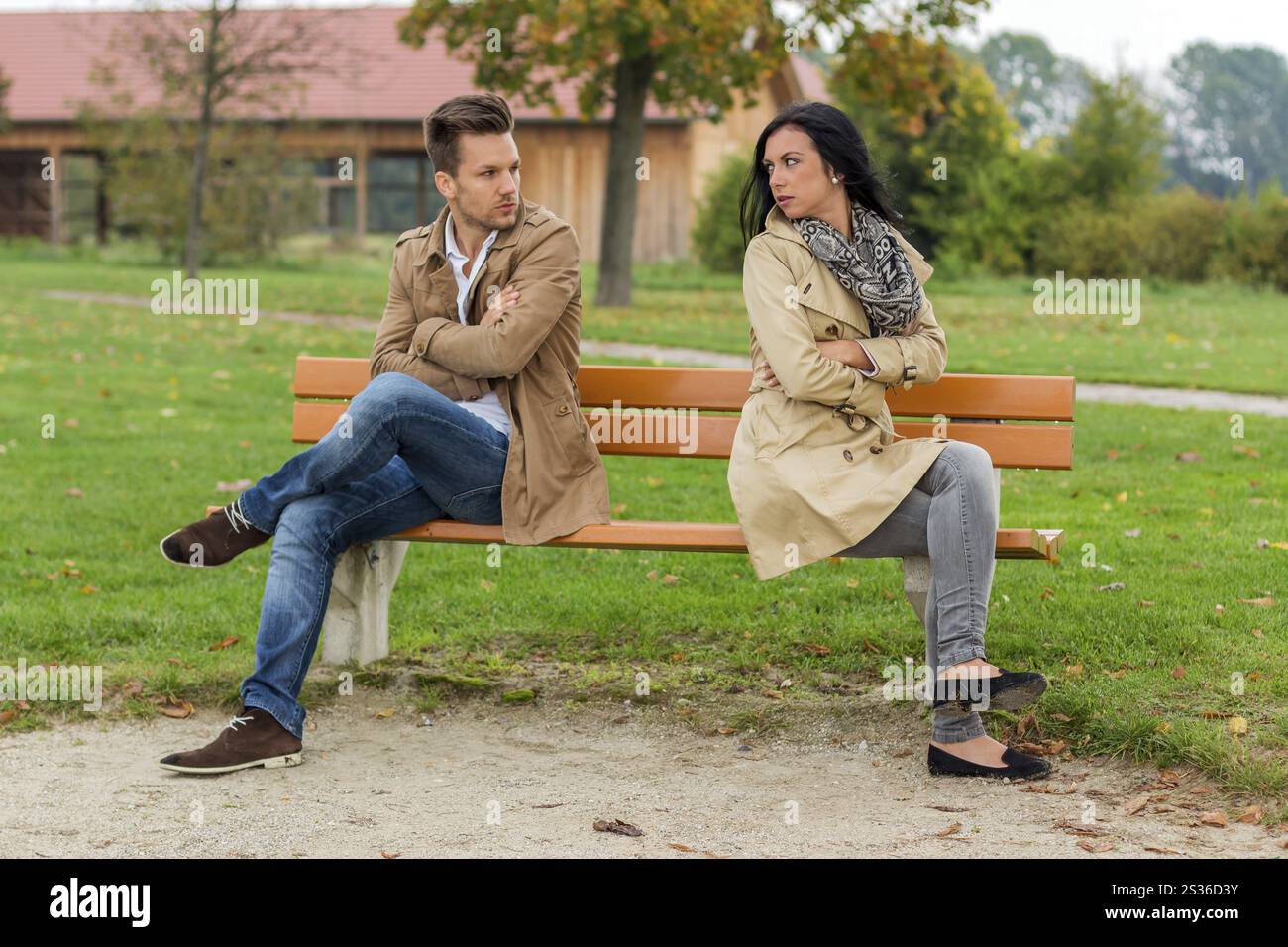 A young couple sits on a park bench and argues Austria Stock Photo - Alamy