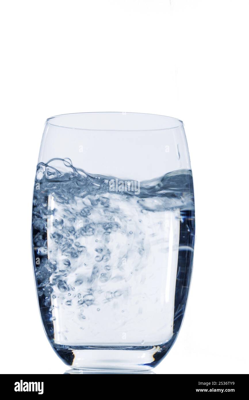 Glass with water, symbolic photo for drinking water, freshness, demand and consumption Stock Photo