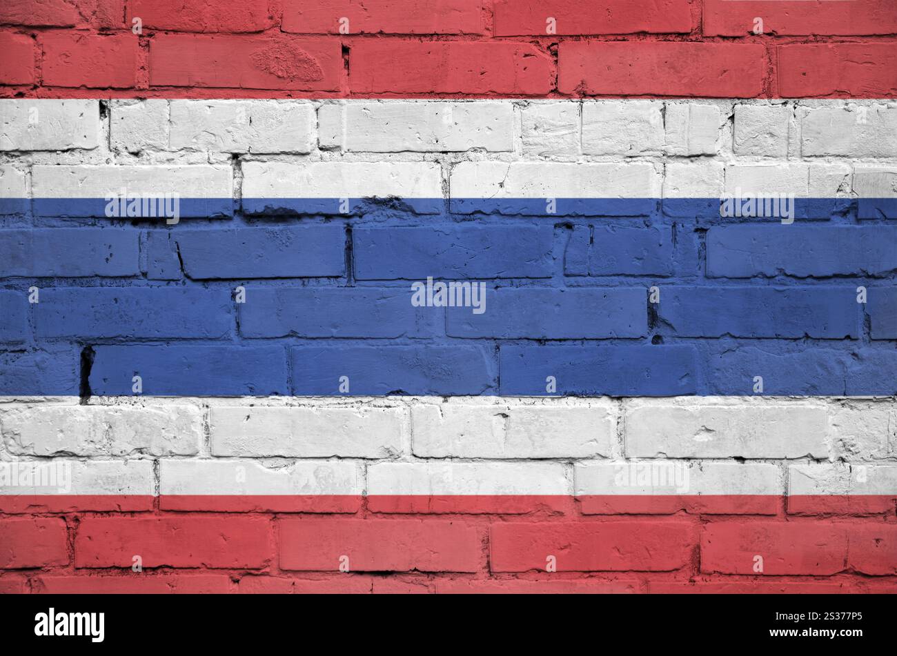 Thailand flag is painted onto an old brick wall Stock Photo - Alamy