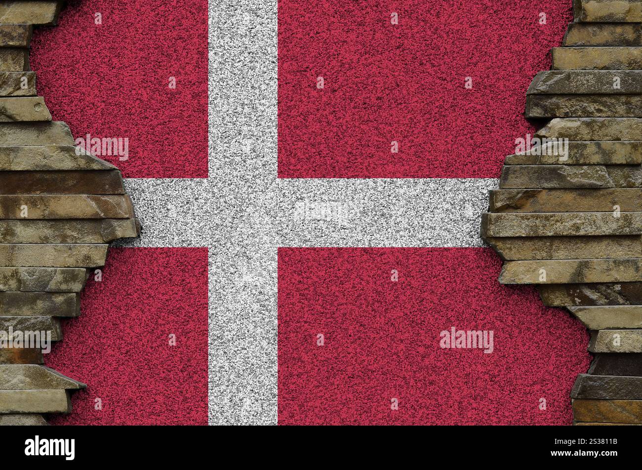 Denmark flag depicted in paint colors on old stone wall close up ...