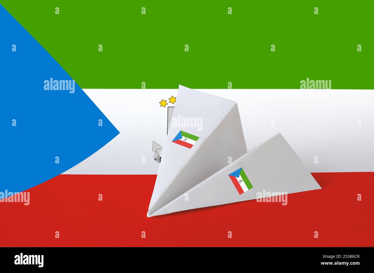 Equatorial Guinea flag depicted on paper origami airplane. Oriental ...