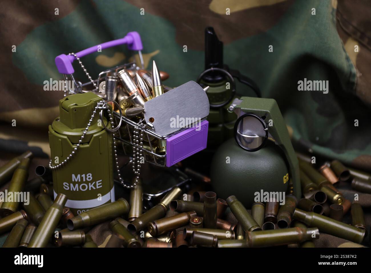 Rifle cartridges in small shopping cart. Big caliber ammo cartridges ...