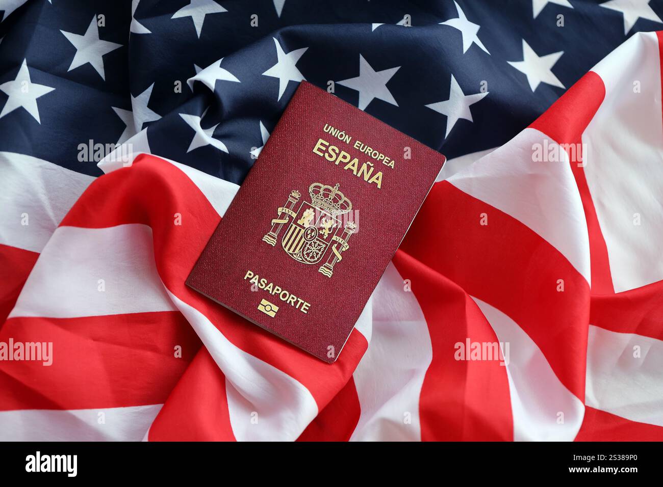 Red Spanish Passport Of European Union On United States National Flag Red Spanish Passport Of European Union On United States National Flag Background Close Up Tourism And Diplomacy Concept Red Spanish Passport Of 2S389P0 