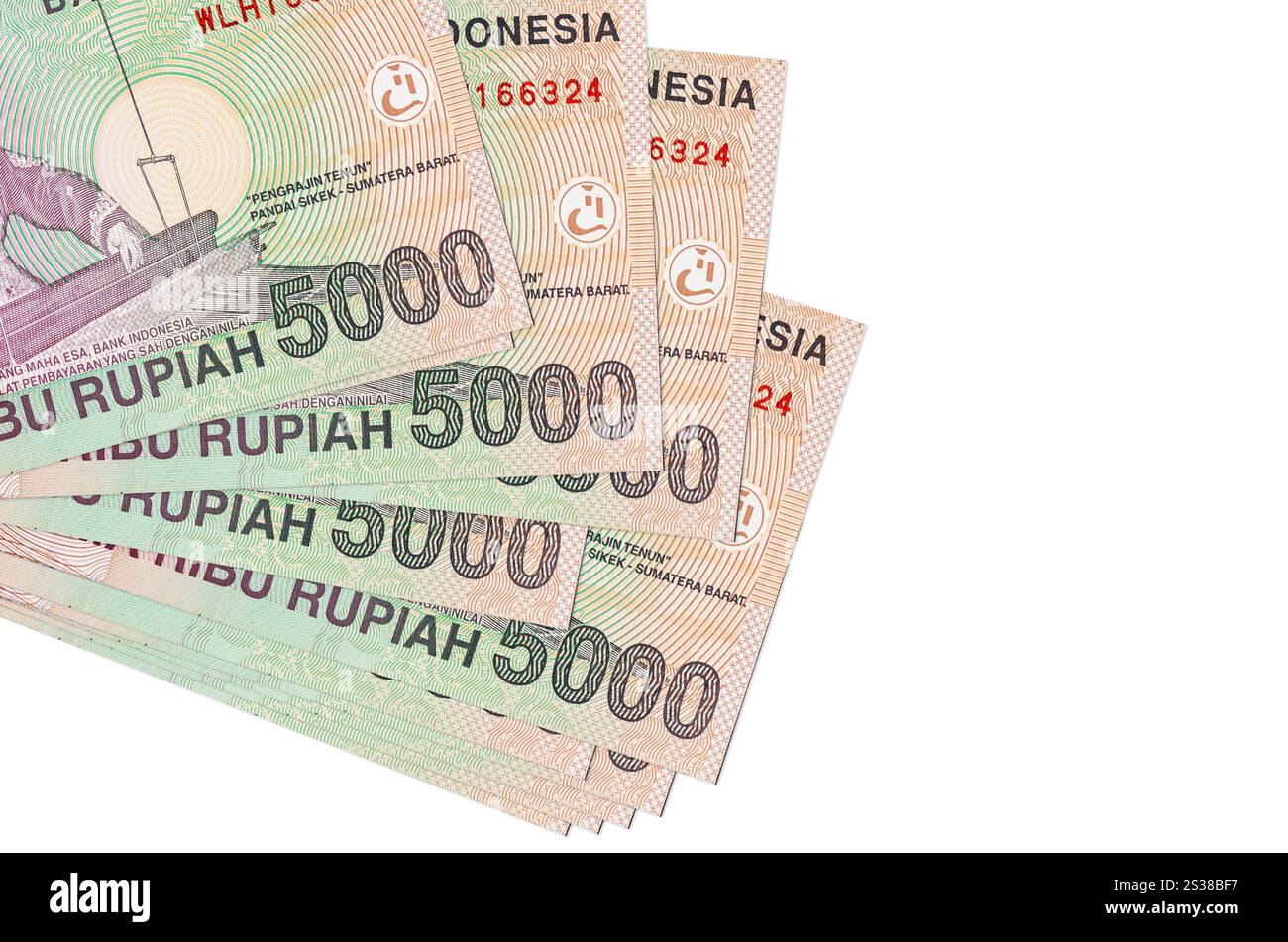 5000 Indonesian rupiah bills lies in small bunch or pack isolated on ...