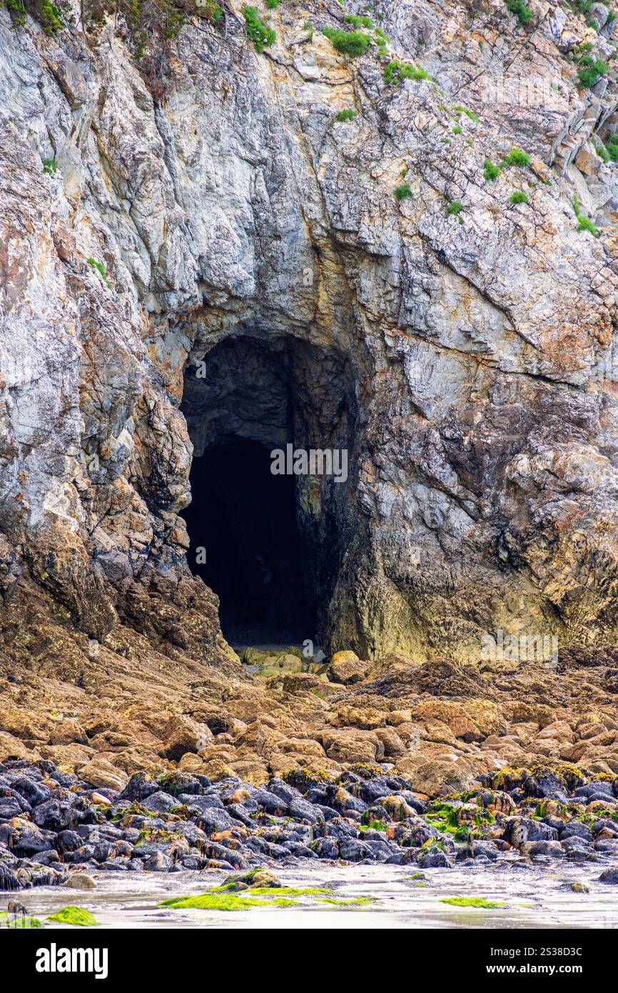 Natural cave in a rock by the sea Stock Photo - Alamy