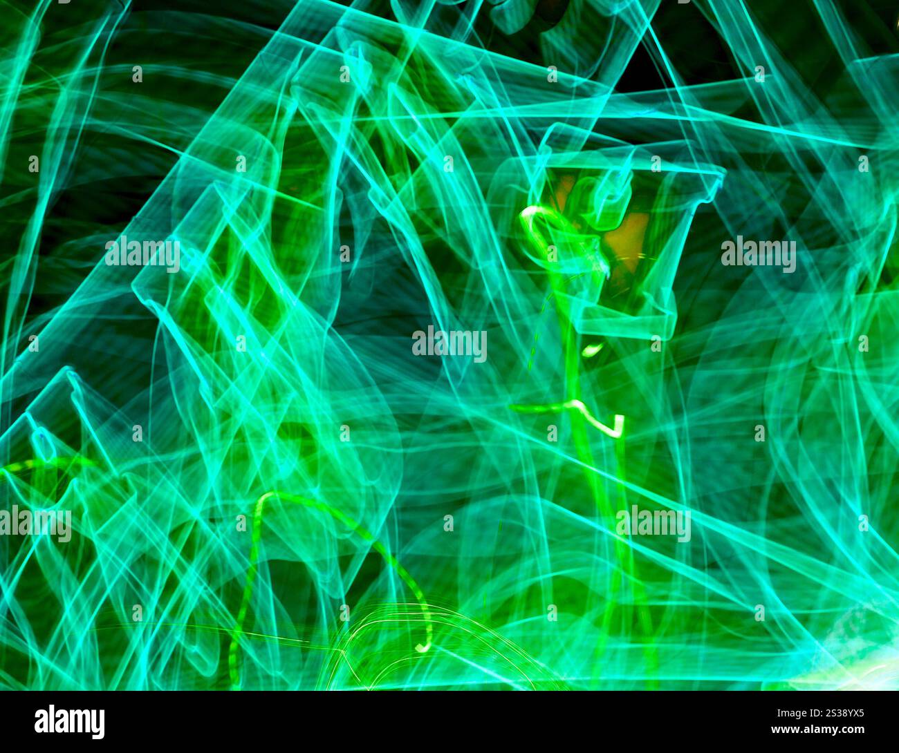 Vibrant green light patterns create a dynamic abstract texture over a ...