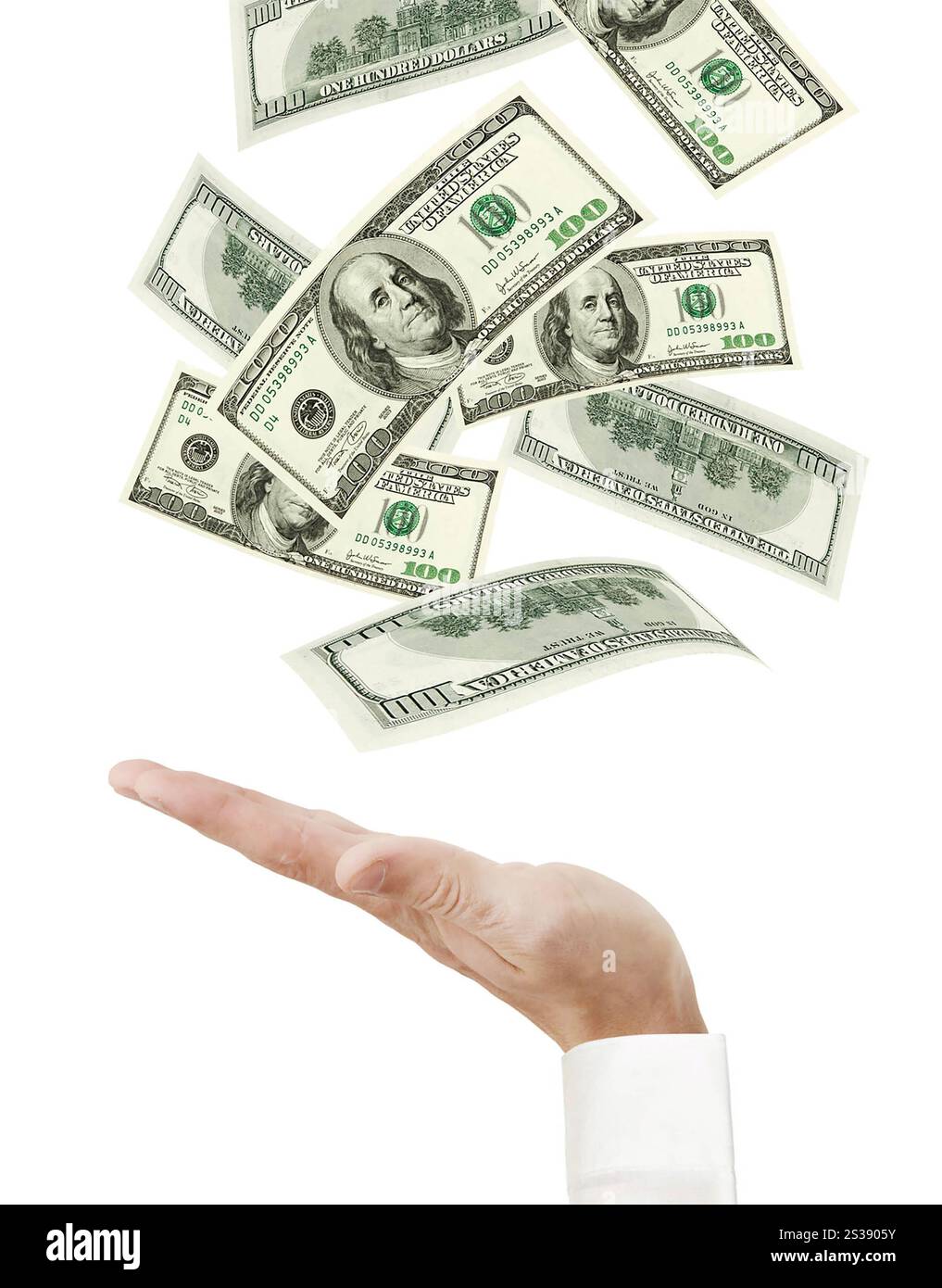 Hand and falling money isolated on white background Stock Photo - Alamy