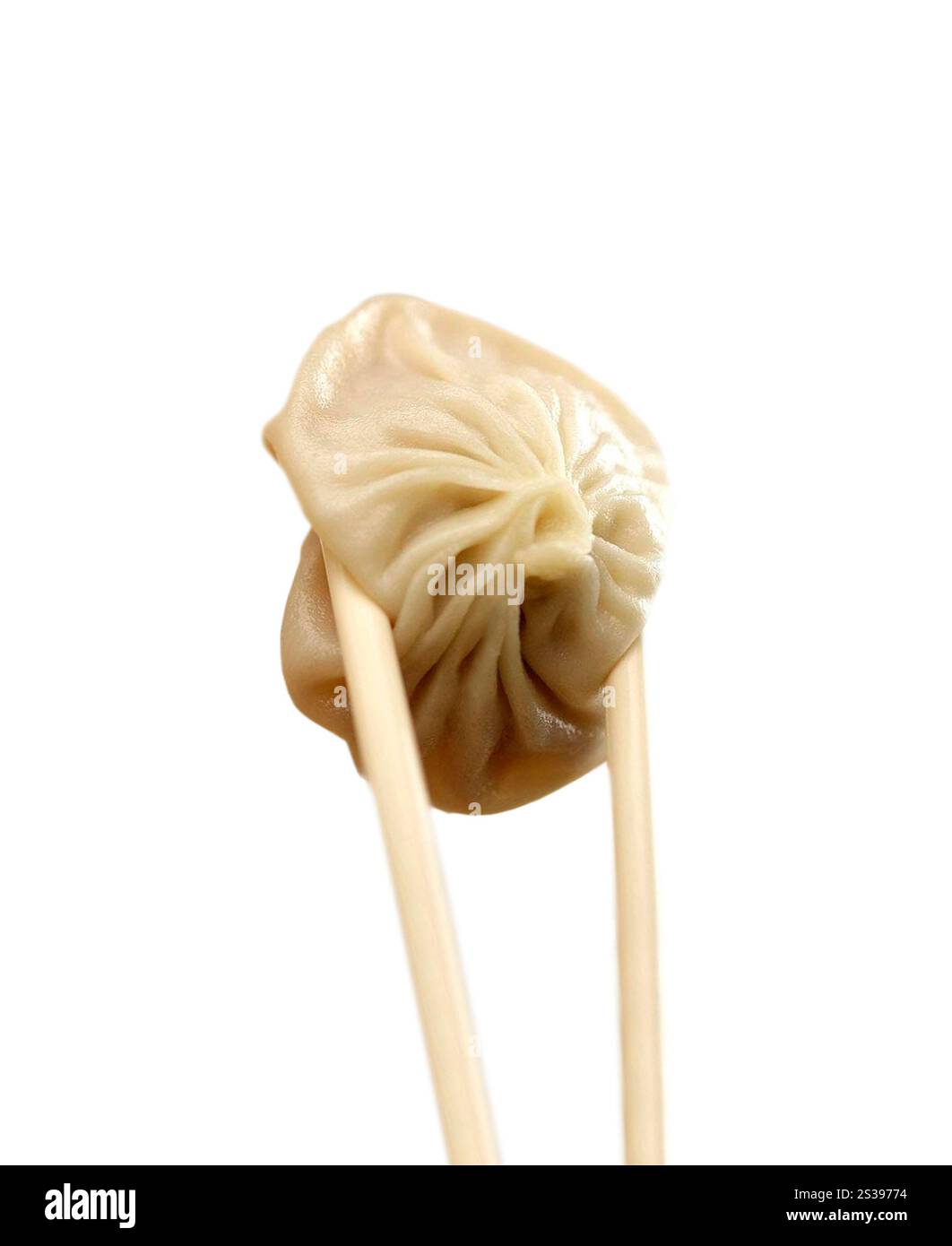 Ravioli with chopsticks isolated on white background Stock Photo