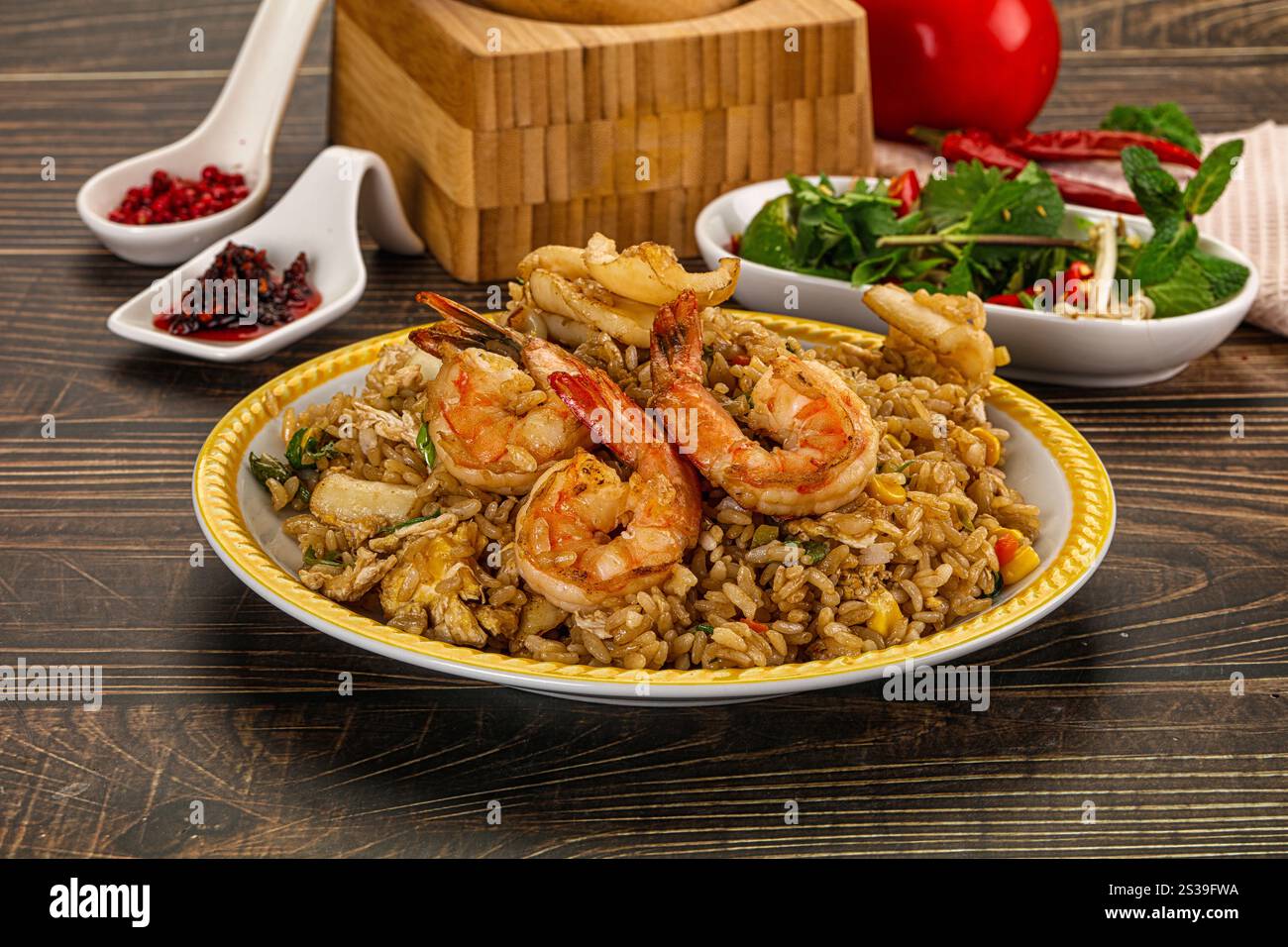 Vietnamese traditional fried rice with prawn and squid - Kom Ran Stock ...