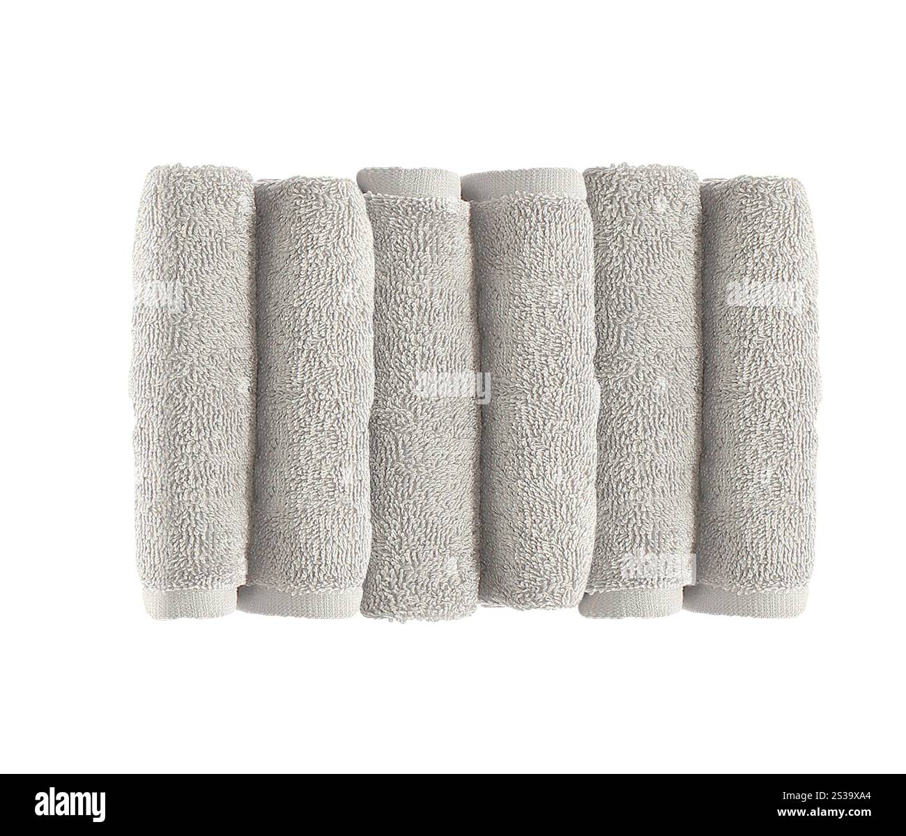 Stack of white plush hotel towels isolated on white background Stock Photo